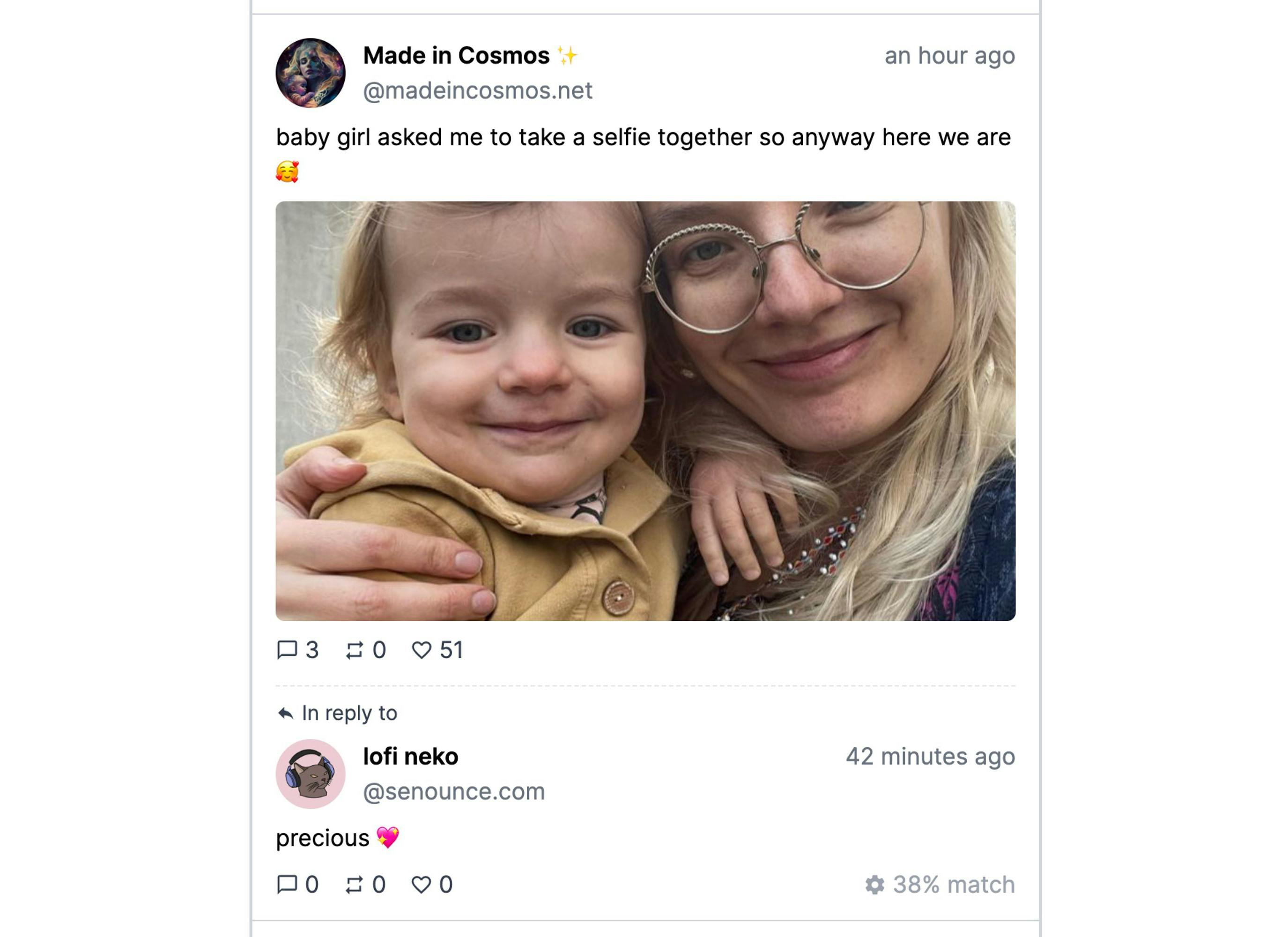 a screenshot of a really wholesome post on Bluesky, showing Made in Cosmos posting a selfie with her daugter + a comment saying "precious 💖"